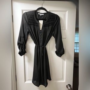 Size S, black dress or long blouse, tie belt